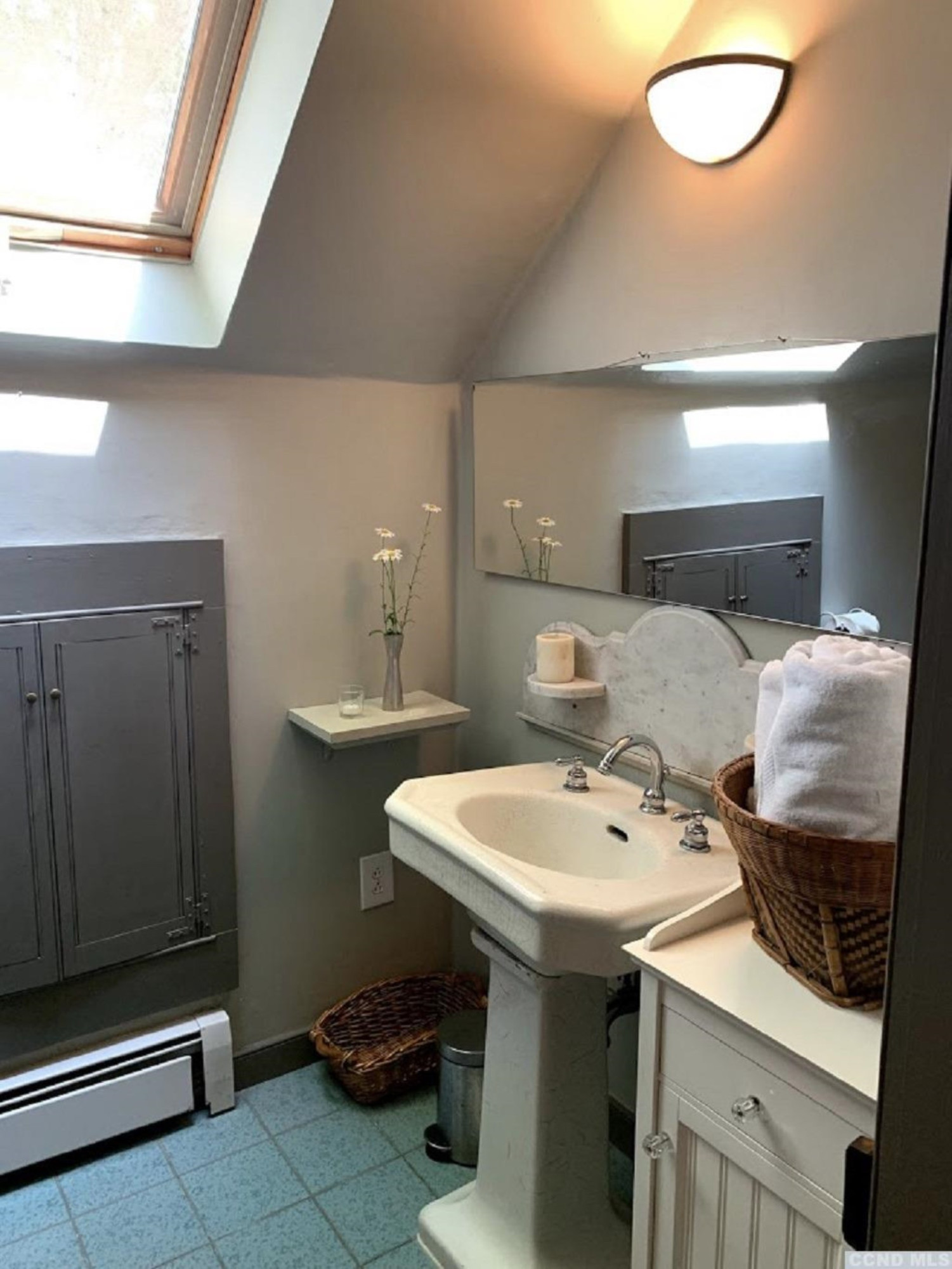 618 A Stonewall Road Austerlitz, NY 12060 - Photo 36 of 37 a bathroom with a sink and a mirror