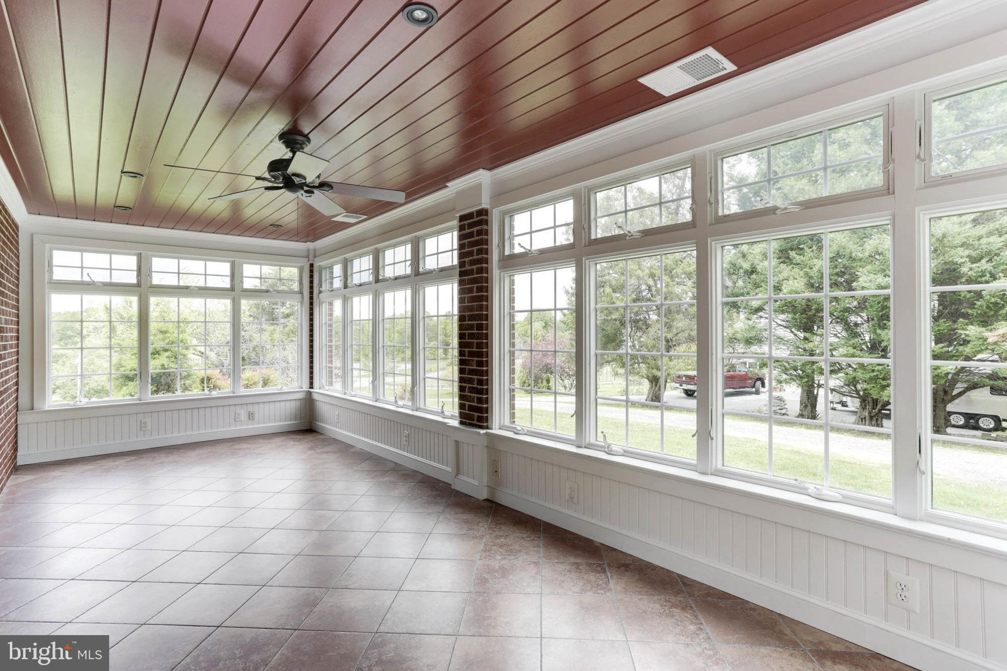 6015 Brooklyn Bridge Road Laurel, MD 20707 - Photo 16 of 52 Charming sun room with heated tile floors