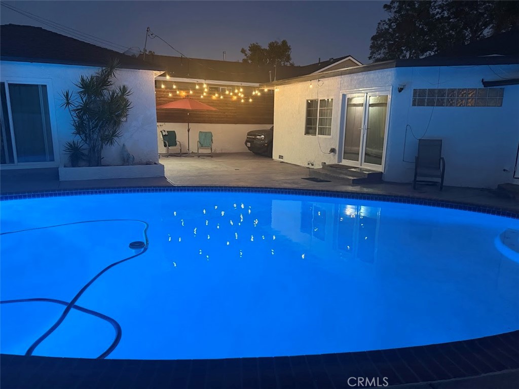 14357 Reis Street Whittier, CA 90604 - Photo 30 of 31 Pool at night, light changes different colors
