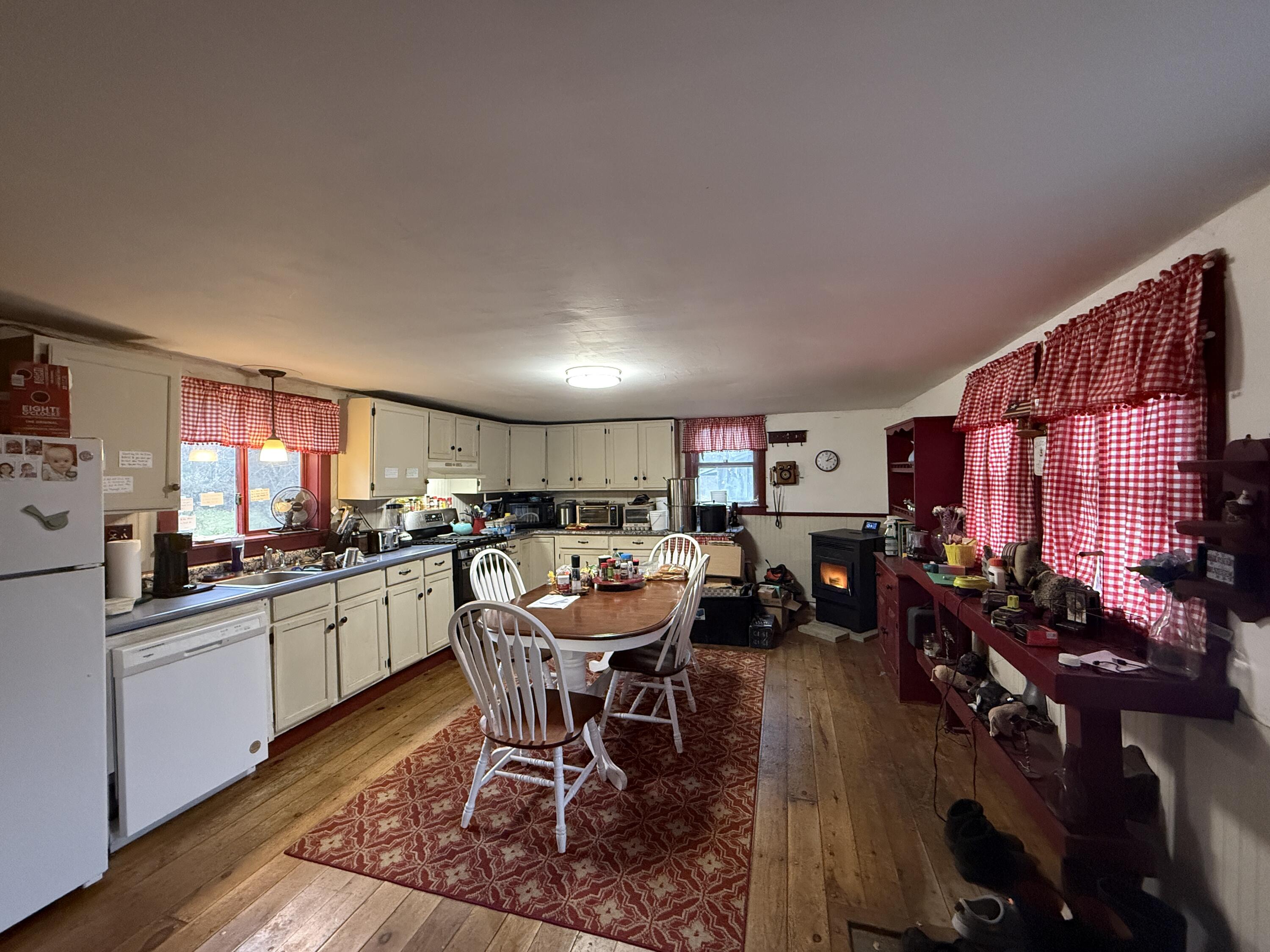 75 Nelson Ridge Road South Washington, ME 04574 - Photo 4 of 27 Pellet Stove In Kitchen