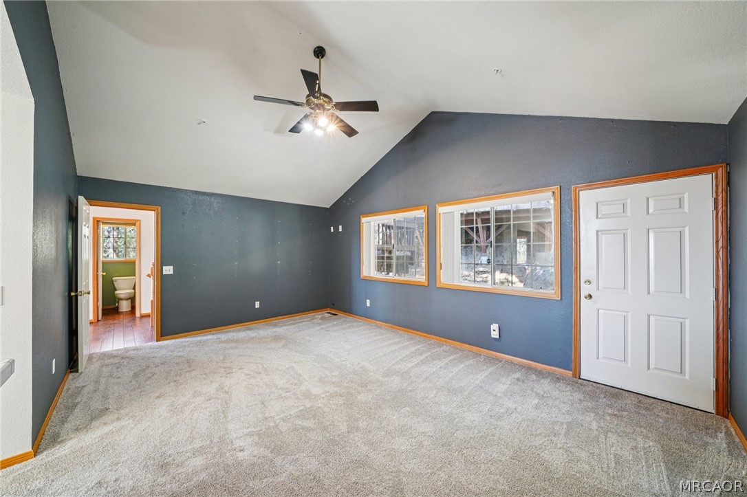 25274 N Road Twin Peaks, CA 92391 - Photo 15 of 41 a view of a livingroom with a ceiling fan and window
