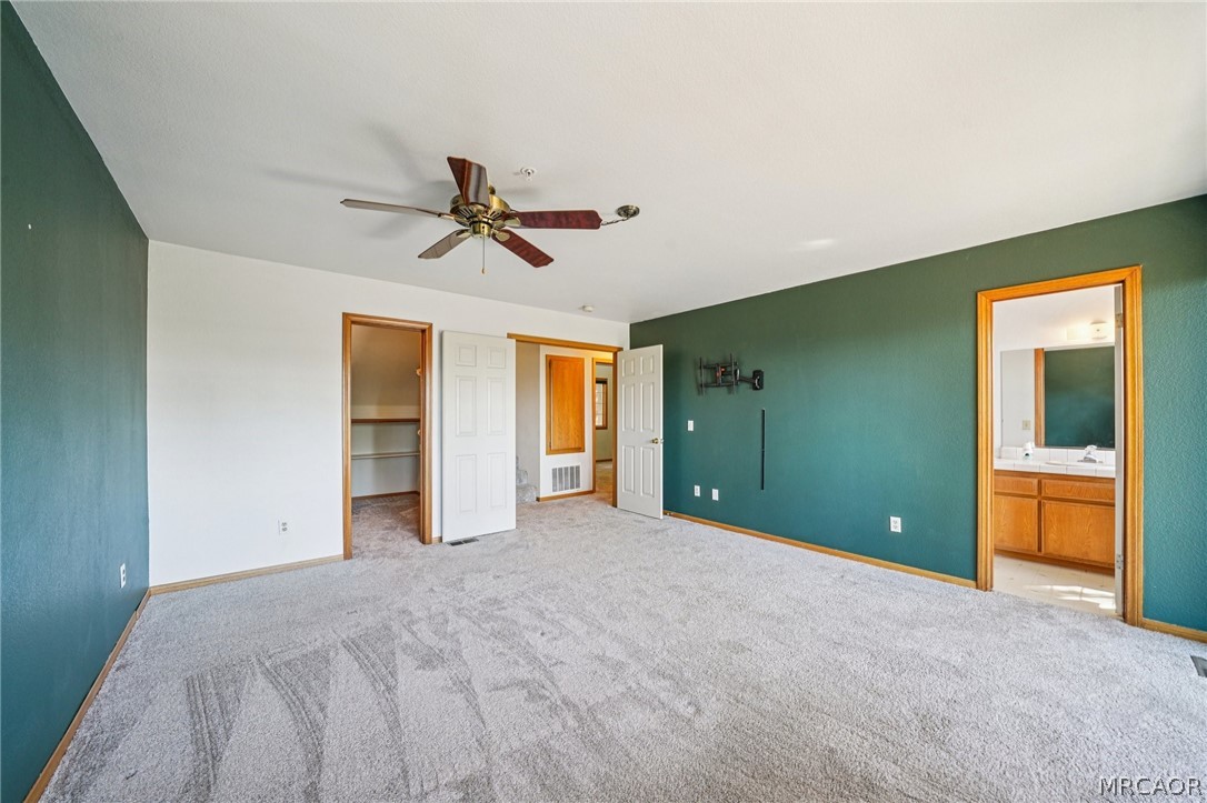 25274 N Road Twin Peaks, CA 92391 - Photo 17 of 41 a view of empty room with window and bathroom