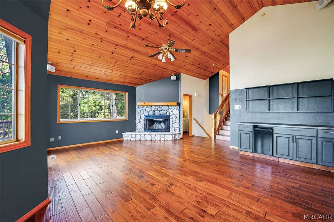 25274 N Road Twin Peaks, CA 92391 - Photo 2 of 41 a view of an empty room with a fireplace and a window