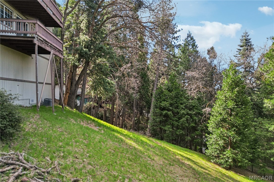 25274 N Road Twin Peaks, CA 92391 - Photo 31 of 41 a backyard of a house with lots of green space