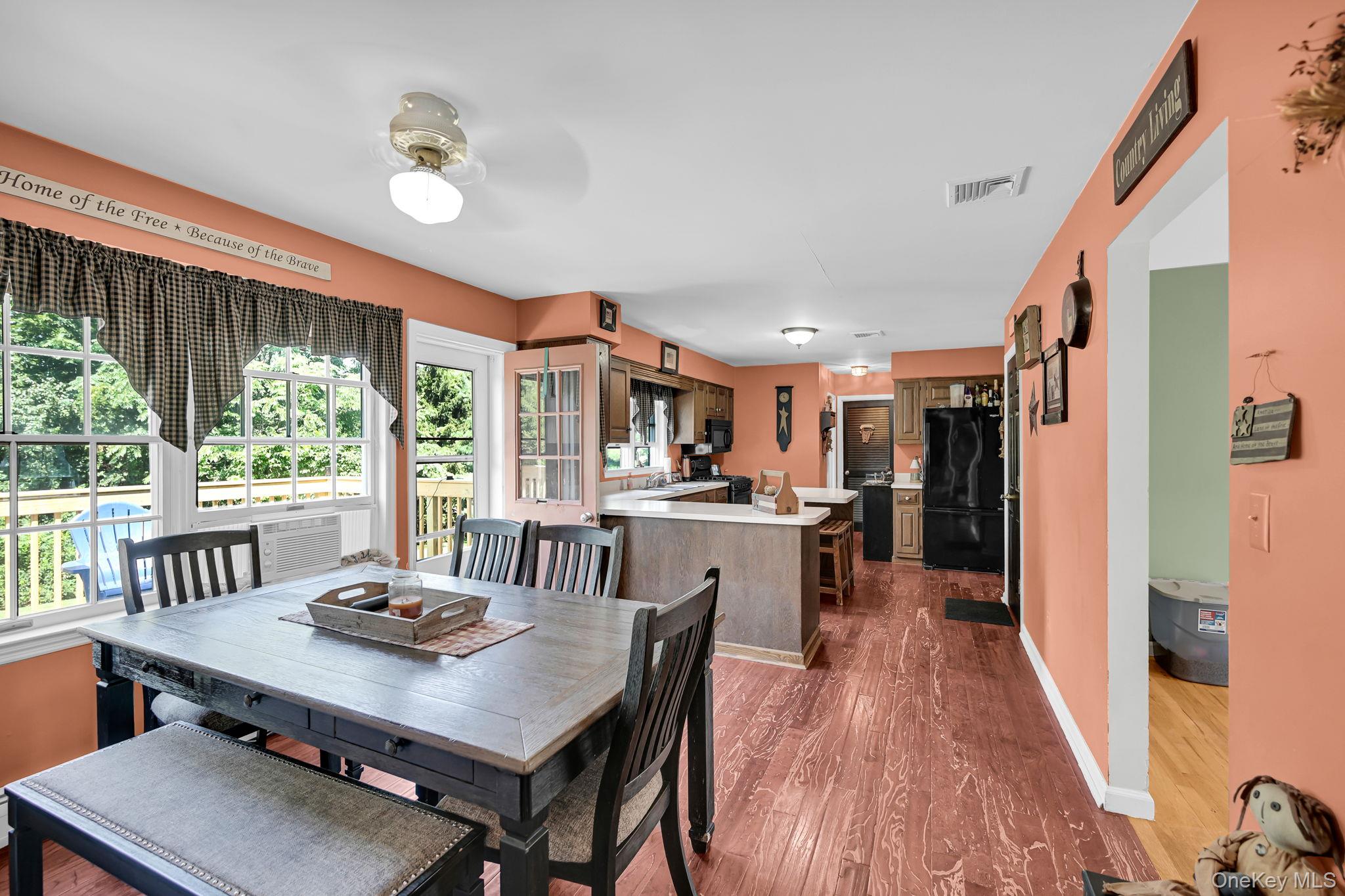 28 Brady Road Warwick, NY 10990 - Photo 11 of 50 a view of a dining room with furniture window and wooden floor