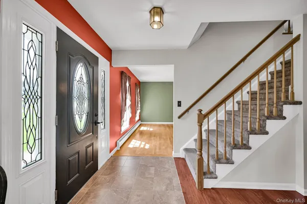 a view of an entryway with a front door