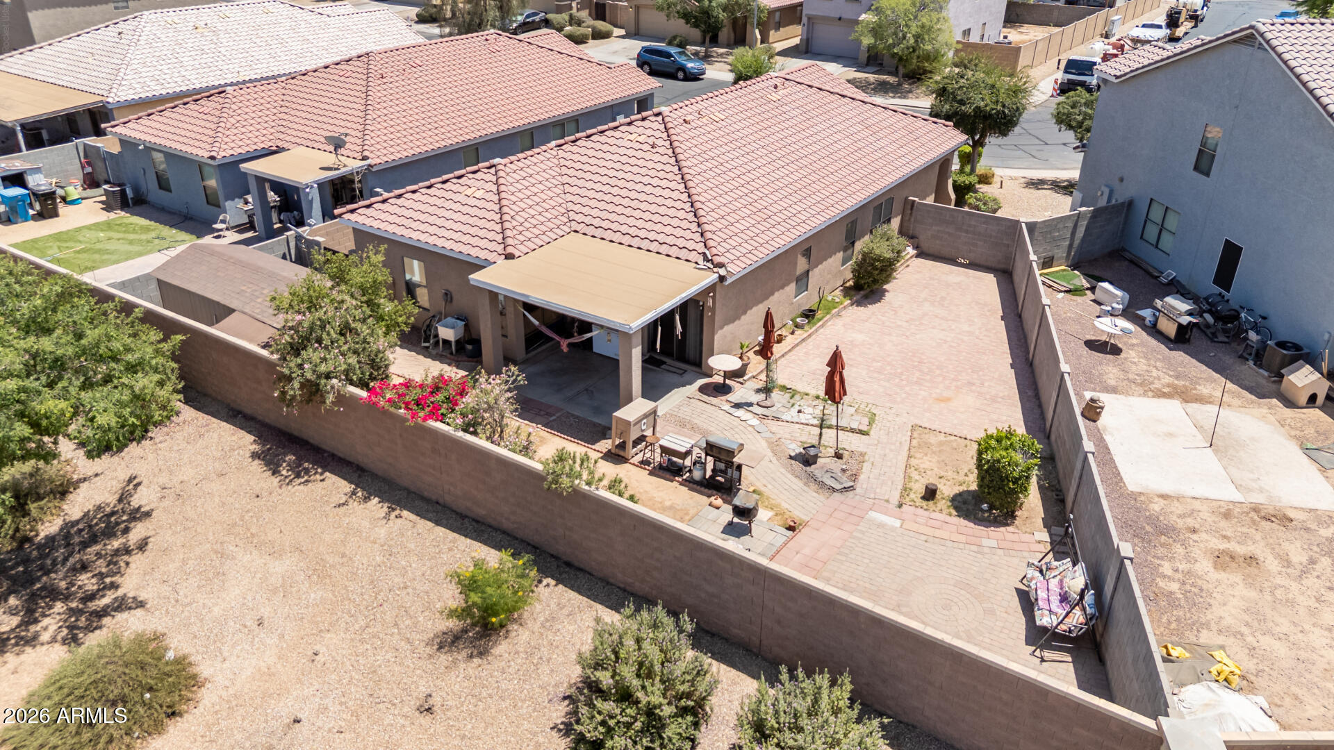 9730 West Payson Road Tolleson, AZ 85353 - Photo 36 of 57 an aerial view of a house with outdoor space