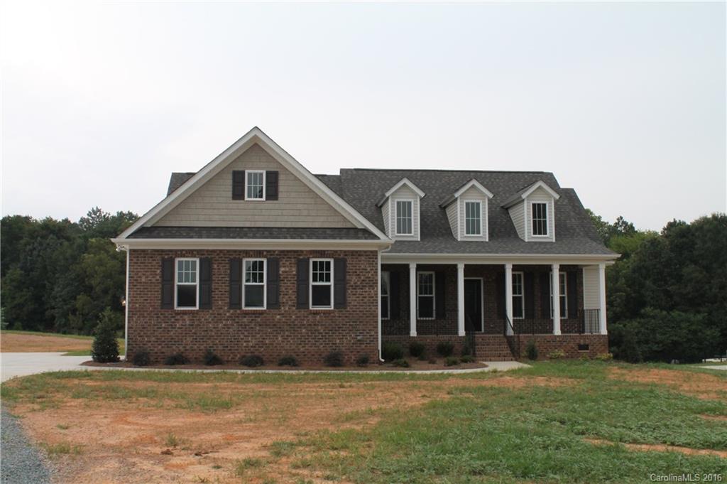 4216 Sincerity Road, Unit 1 Monroe, NC 28110 - Photo 1 of 21 a front view of a house with a yard