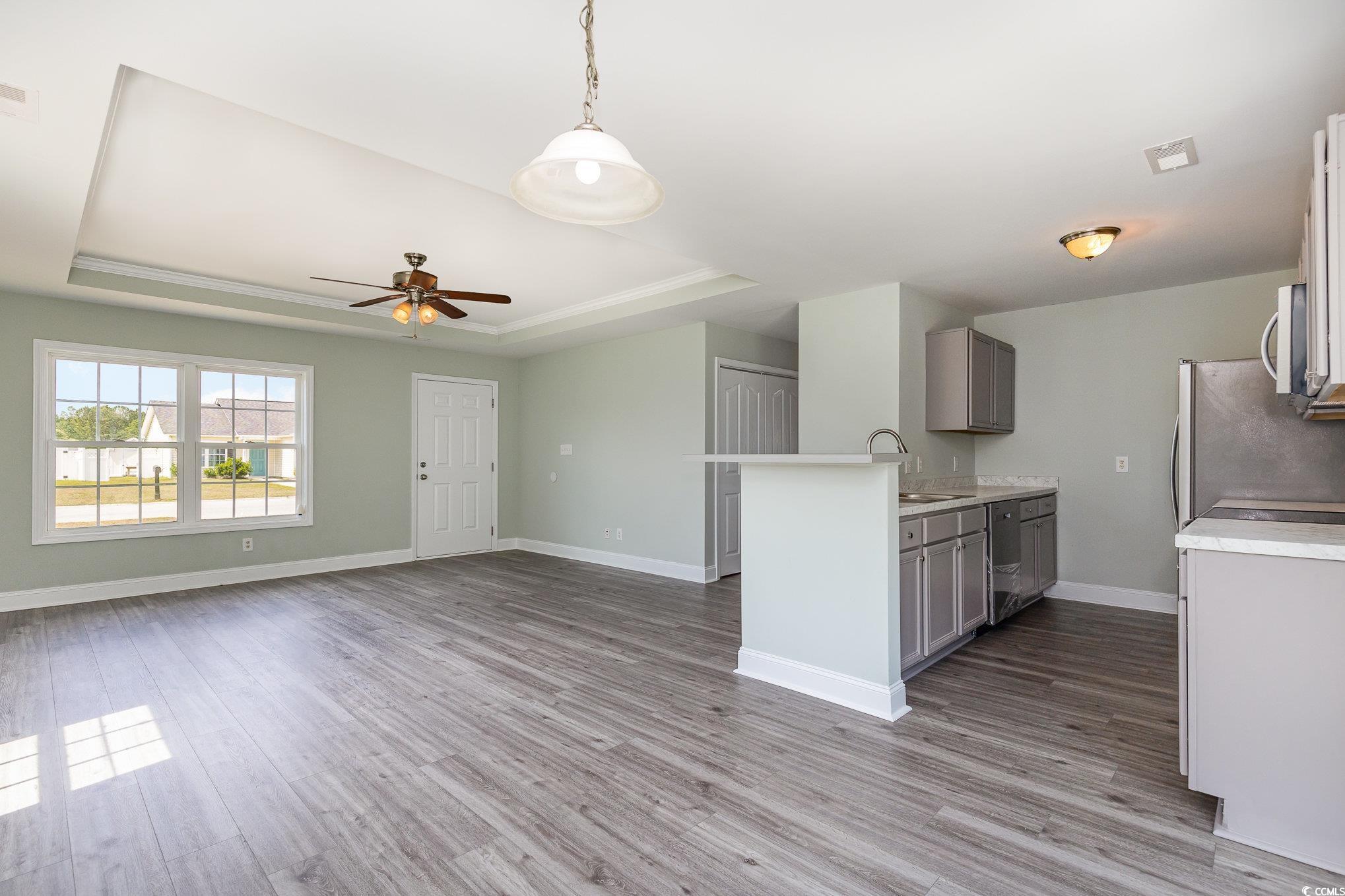 469 Overcrest Street Myrtle Beach, SC 29579 - Photo 5 of 18 Kitchen with a sink, light countertops, stainless