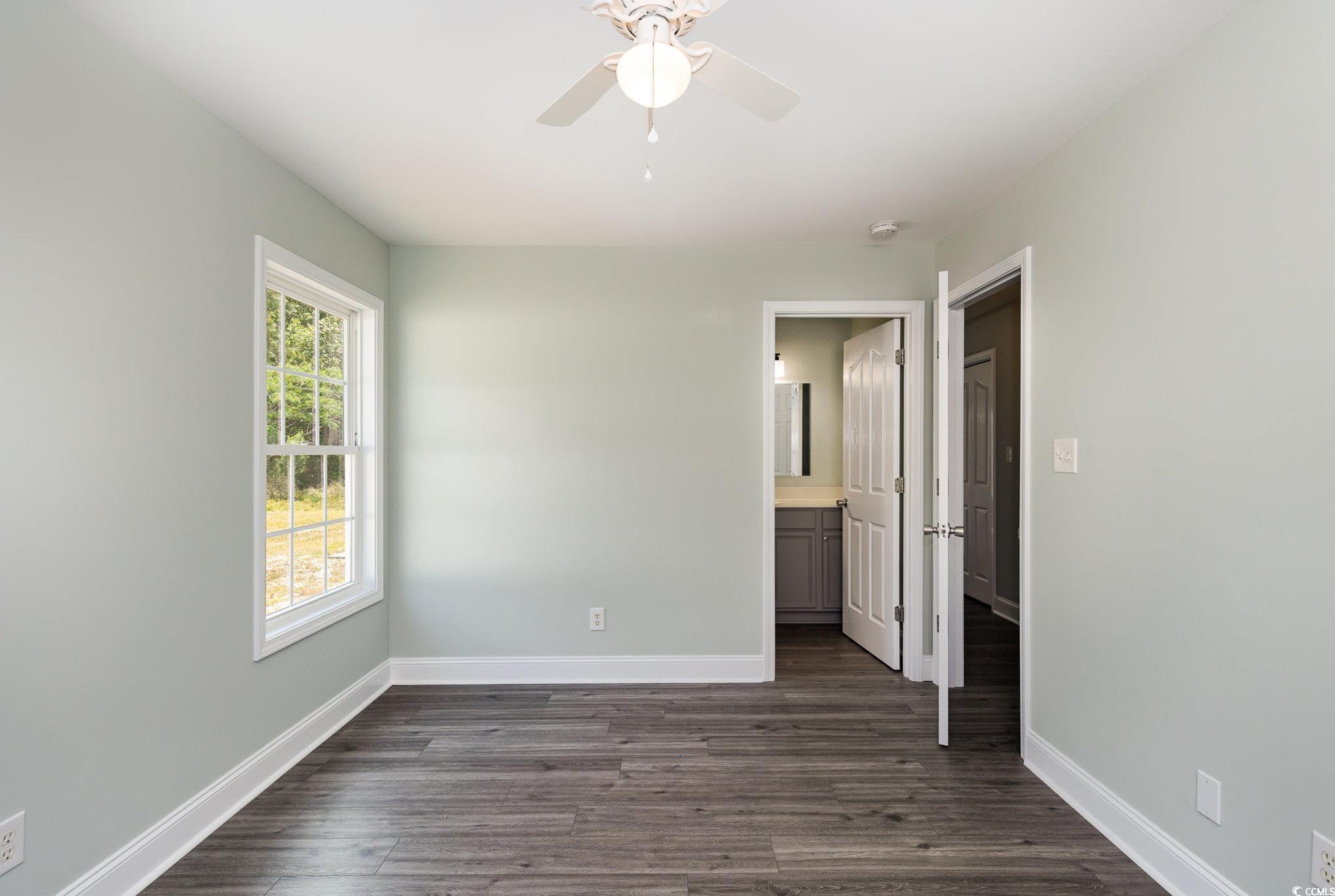 469 Overcrest Street Myrtle Beach, SC 29579 - Photo 8 of 18 Unfurnished bedroom featuring baseboards, connecte