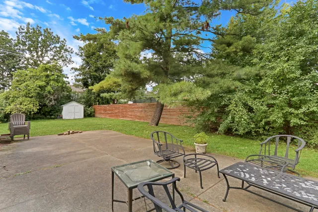 a garden view with a seating space