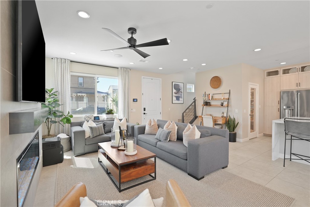32522 Brunello Way Temecula, CA 92591 - Photo 13 of 75 a living room with furniture and a large window