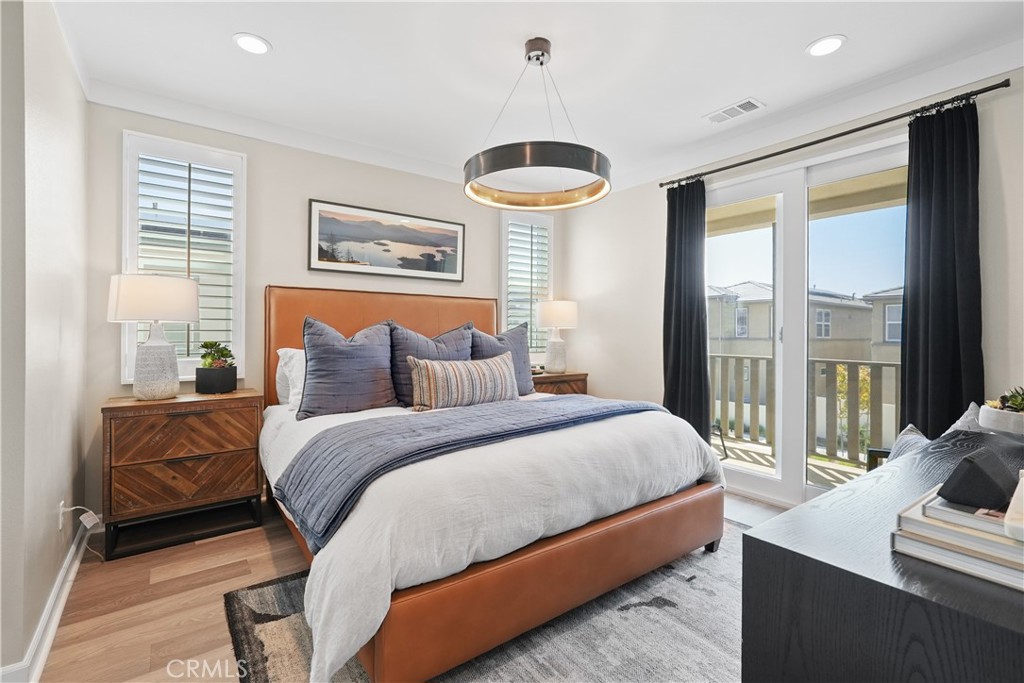32522 Brunello Way Temecula, CA 92591 - Photo 38 of 75 a bedroom with a bed and a large window
