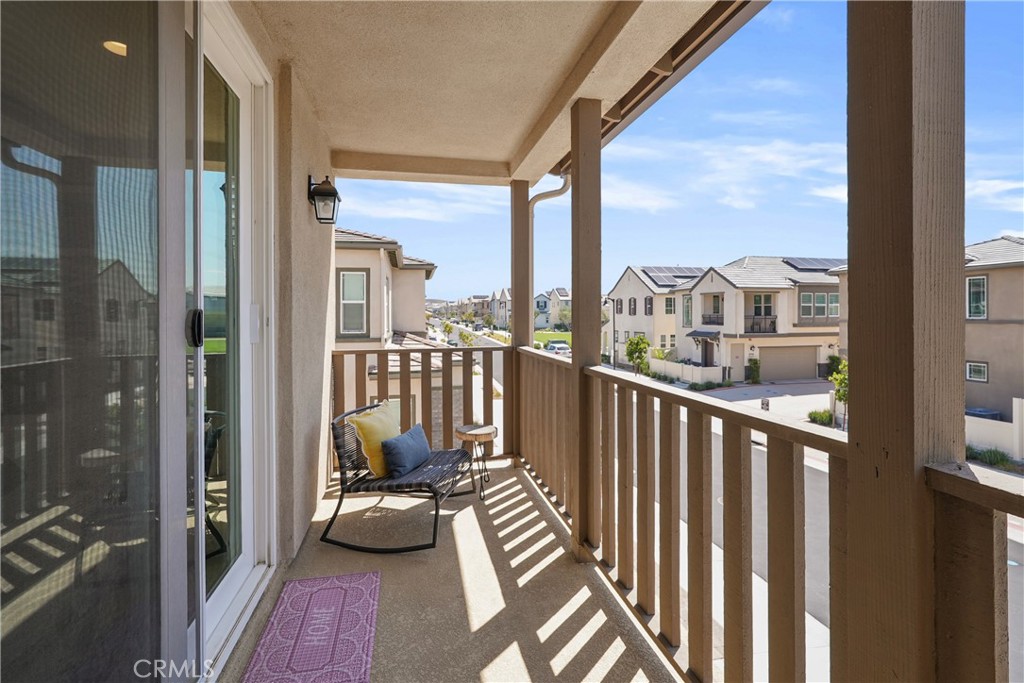 32522 Brunello Way Temecula, CA 92591 - Photo 39 of 75 a view of a balcony with couch