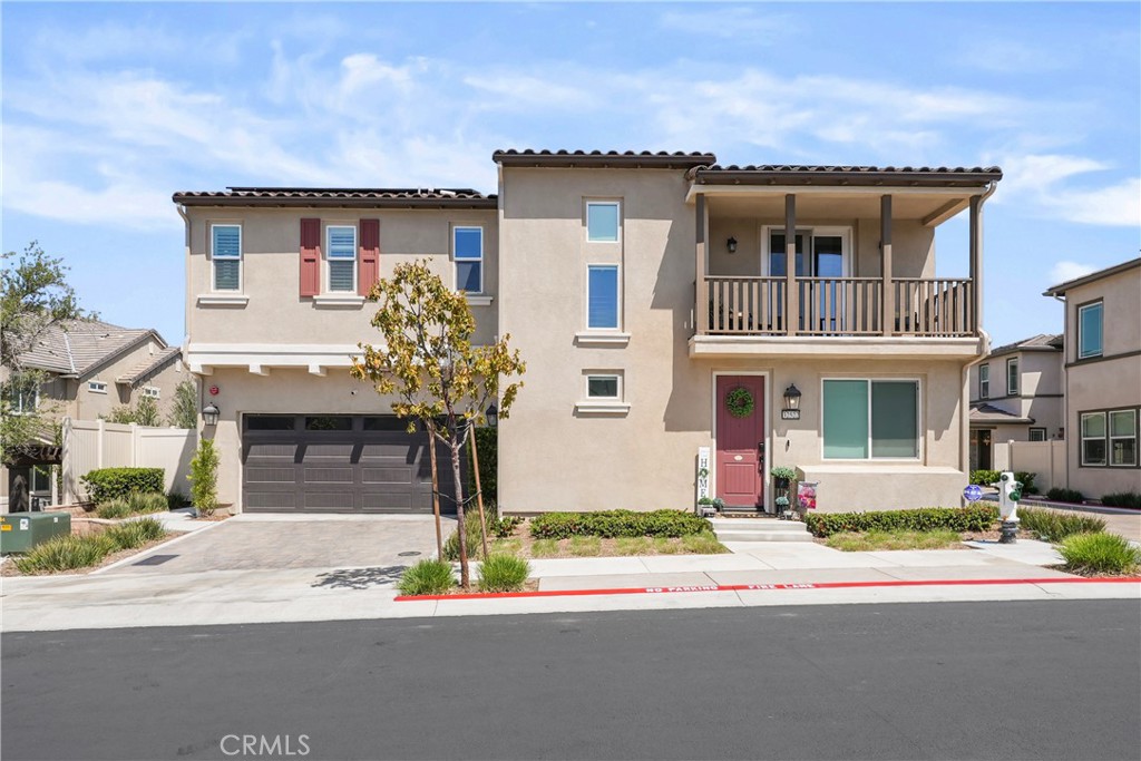 32522 Brunello Way Temecula, CA 92591 - Photo 4 of 75 a front view of a house with a yard