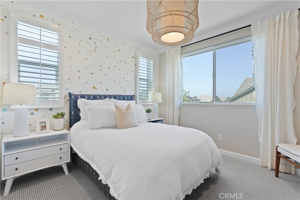 32522 Brunello Way Temecula, CA 92591 - Photo 48 of 75 a bedroom with a bed and window