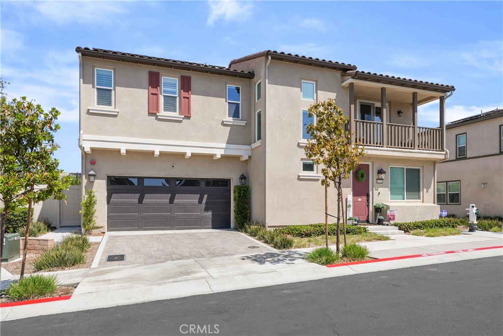 32522 Brunello Way Temecula, CA 92591 - Photo 5 of 75 a front view of a house with a yard