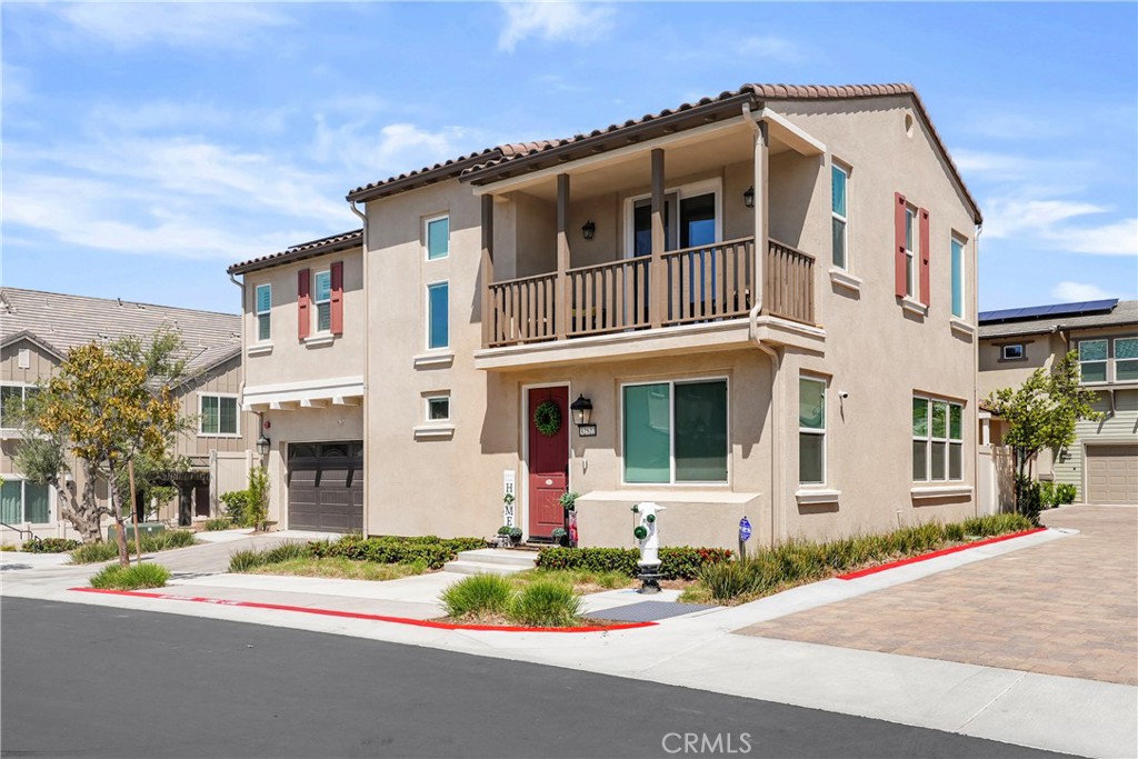 32522 Brunello Way Temecula, CA 92591 - Photo 6 of 75 a front view of a house with a yard