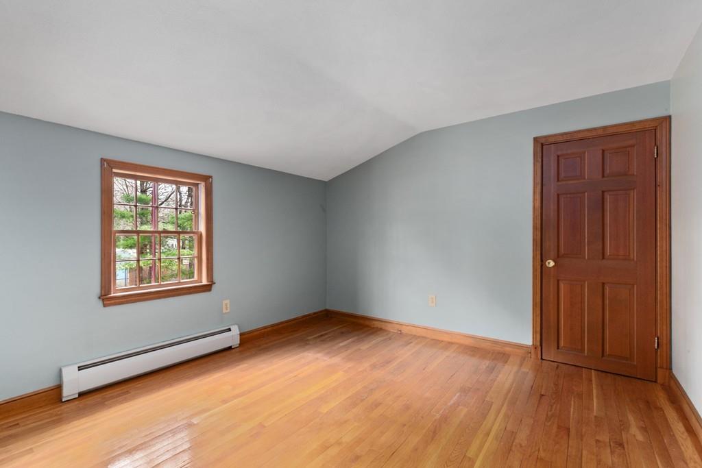 2 Craig Lane Hingham, MA 02043 - Photo 16 of 18 an empty room with wooden floor and windows