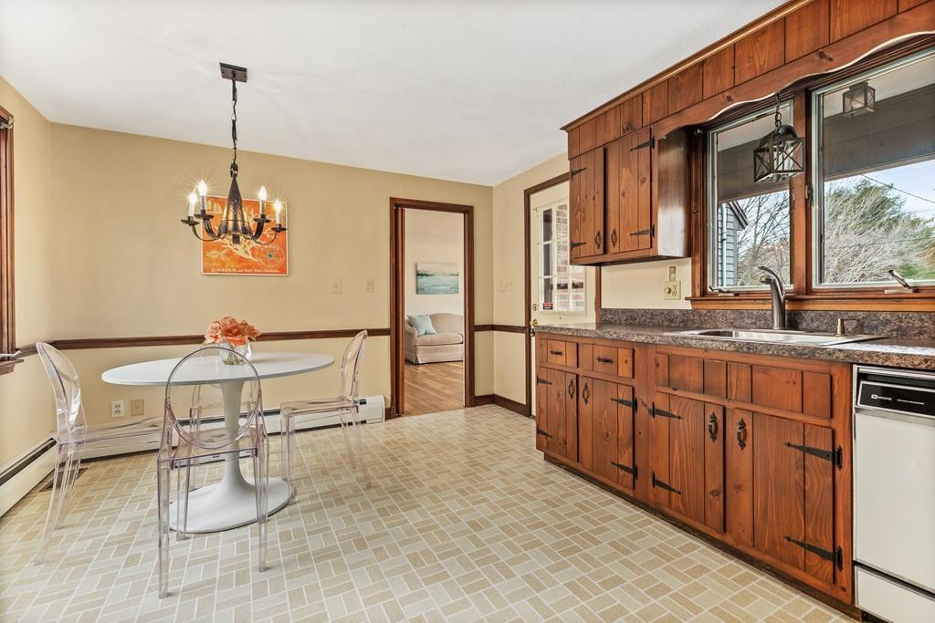2 Craig Lane Hingham, MA 02043 - Photo 3 of 18 a living room with granite countertop furniture and a chandelier