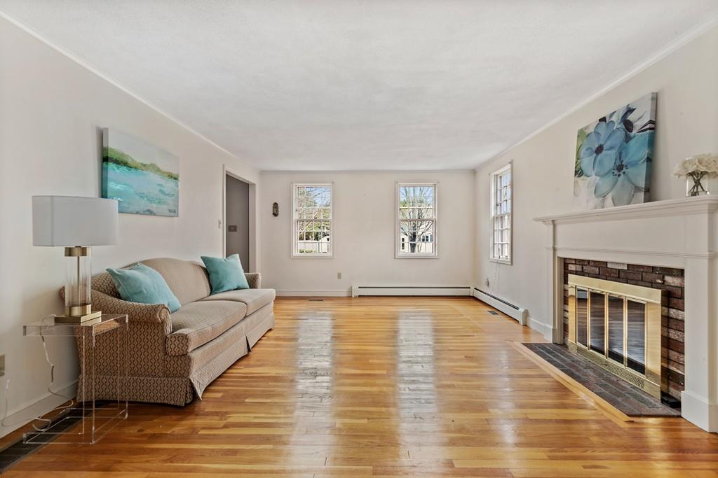 2 Craig Lane Hingham, MA 02043 - Photo 6 of 18 a living room with furniture and a fireplace