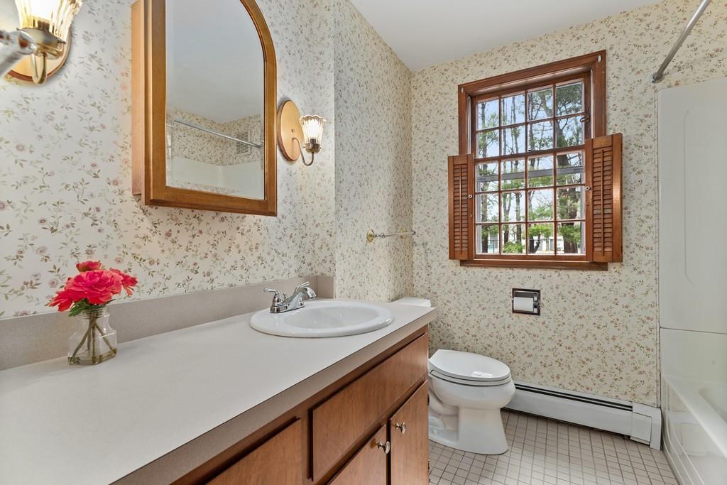 2 Craig Lane Hingham, MA 02043 - Photo 9 of 18 a bathroom with a toilet sink and mirror