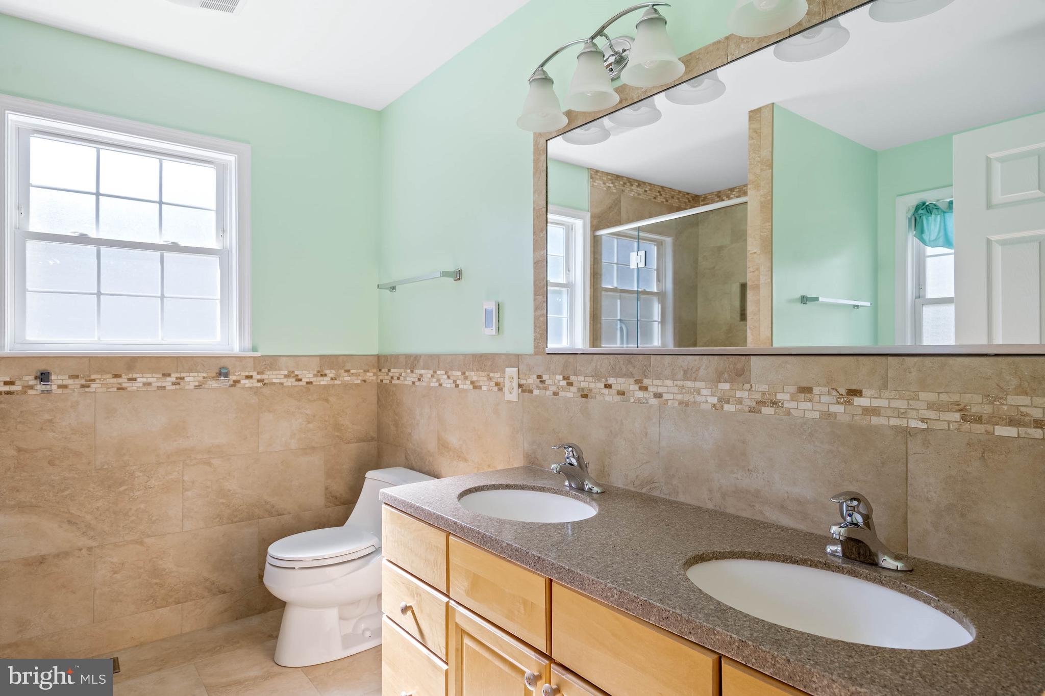 4 Alderleaf Drive Lewes, DE 19958 - Photo 20 of 43 a bathroom with a sink and a mirror