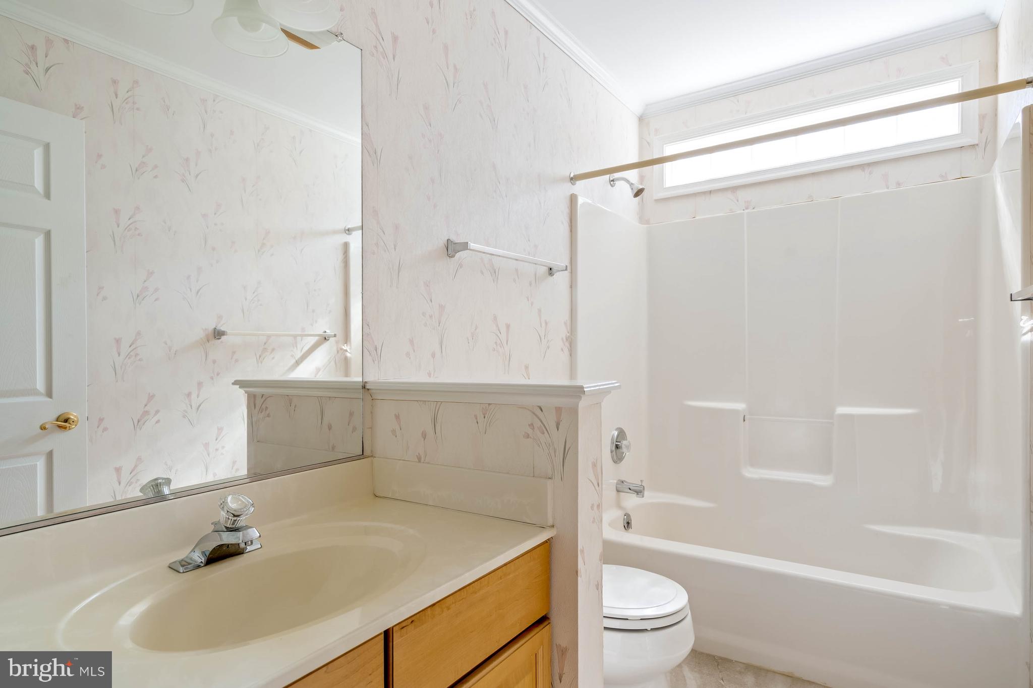 4 Alderleaf Drive Lewes, DE 19958 - Photo 27 of 43 a bathroom with a sink toilet and shower