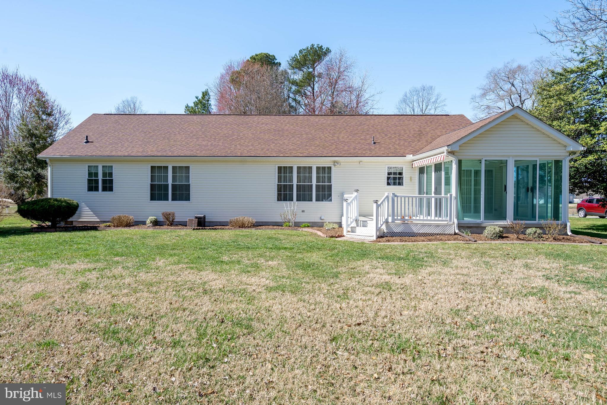 4 Alderleaf Drive Lewes, DE 19958 - Photo 29 of 43 a view of a house with backyard and porch
