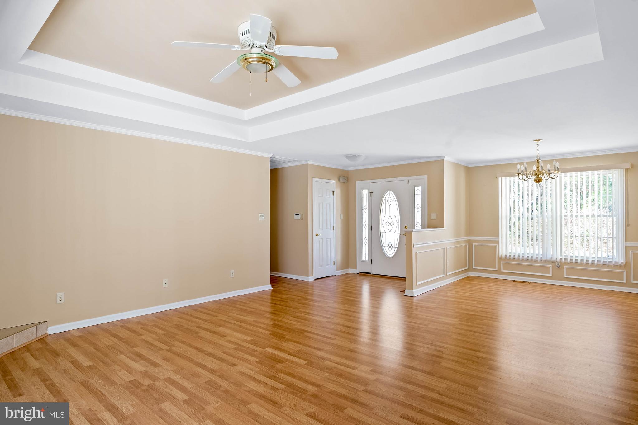 4 Alderleaf Drive Lewes, DE 19958 - Photo 3 of 43 a view of an empty room with a window and wooden floor