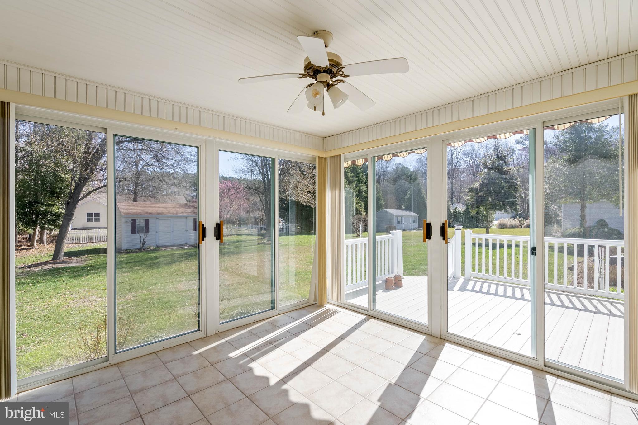 4 Alderleaf Drive Lewes, DE 19958 - Photo 31 of 43 a view of a porch with a floor to ceiling windows