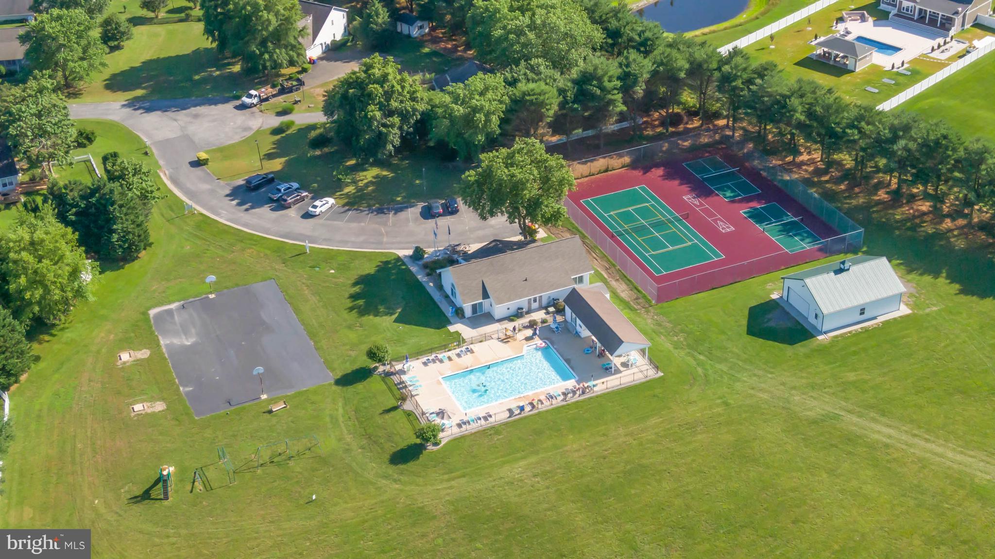 4 Alderleaf Drive Lewes, DE 19958 - Photo 40 of 43 an aerial view of residential house with outdoor space and swimming pool
