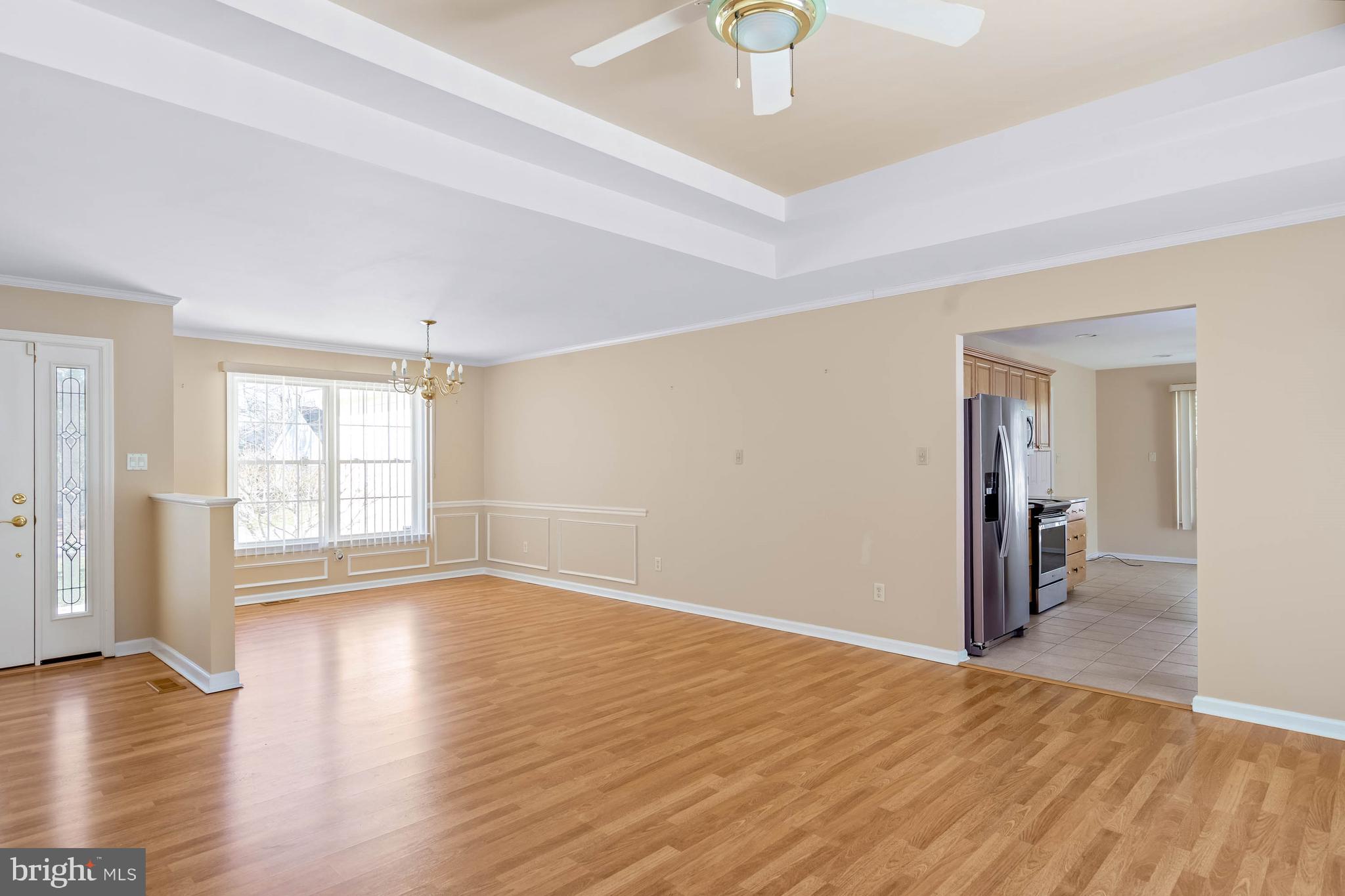 4 Alderleaf Drive Lewes, DE 19958 - Photo 4 of 43 wooden floor in an empty room with a window