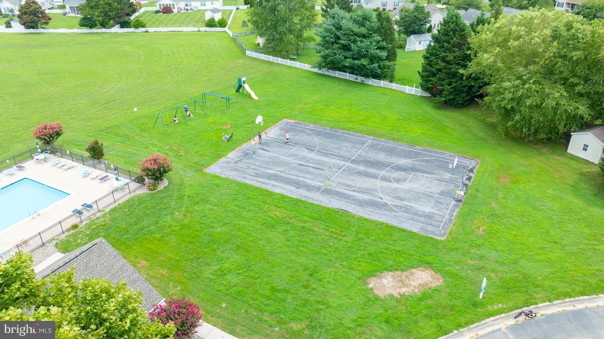 4 Alderleaf Drive Lewes, DE 19958 - Photo 42 of 43 a view of a backyard with a garden