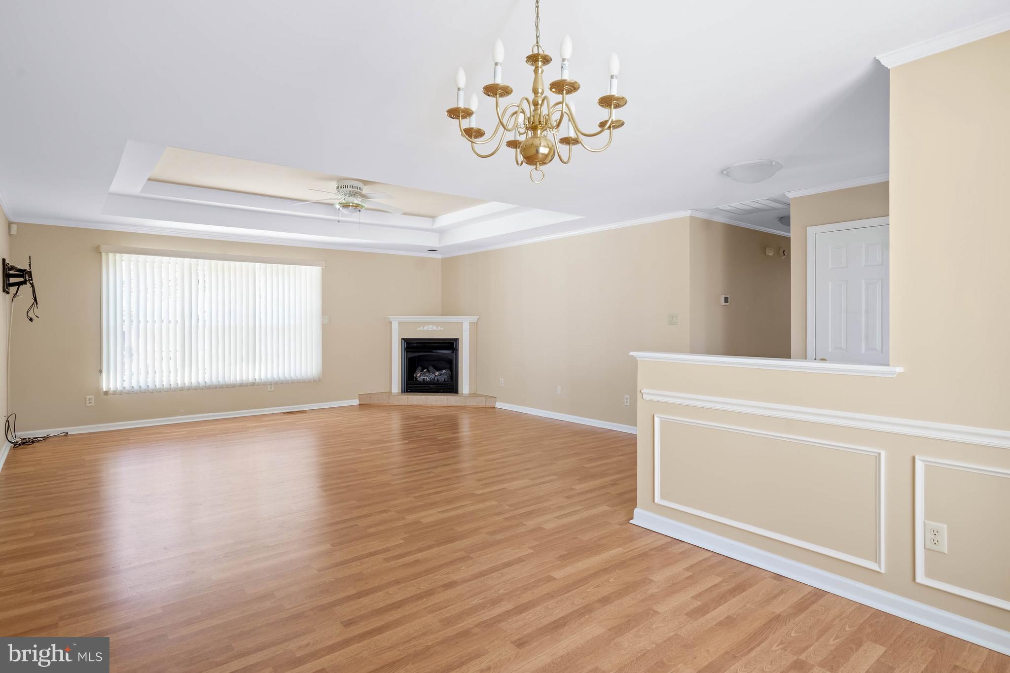 4 Alderleaf Drive Lewes, DE 19958 - Photo 6 of 43 wooden floor in an empty room with a window
