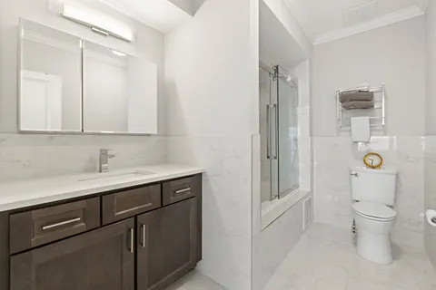 a bathroom with a sink and a toilet