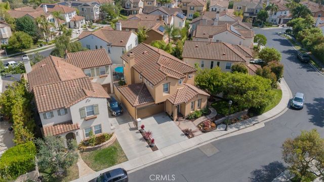 an aerial view of a house with garden