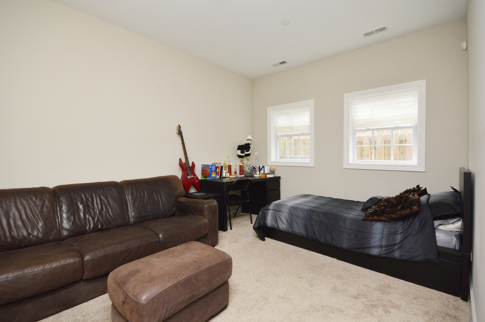 1631 Church Street Evanston, IL 60201 - Photo 14 of 19 a living room with furniture a couch and a window