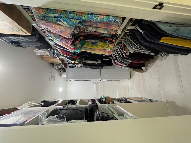 2910 Pecan Springs Road, Unit A Austin, TX 78723 - Photo 14 of 39 Walk in closet featuring stacked washer and dryer