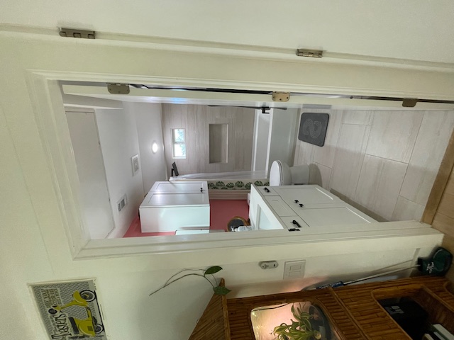 2910 Pecan Springs Road, Unit A Austin, TX 78723 - Photo 21 of 39 Bathroom with vanity, shower / bath combo with patterned floors