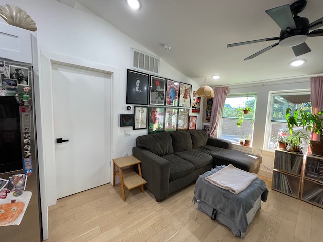 2910 Pecan Springs Road, Unit A Austin, TX 78723 - Photo 36 of 39 Living area with lofted ceiling, light wood finished floors, recessed lighting, and ceiling fan