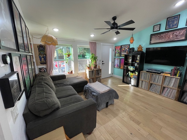2910 Pecan Springs Road, Unit A Austin, TX 78723 - Photo 38 of 39 Living room with lofted ceiling, hardwood / wood-style floors, a ceiling fan, and recessed lighting