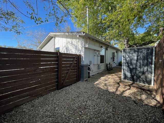 2910 Pecan Springs Road, Unit A Austin, TX 78723 - Photo 10 of 39 View of property exterior with fencing