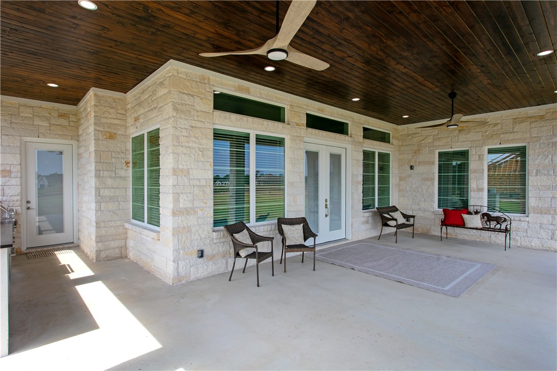 7844 Mathis Crk Drive Bryan, TX 77808 - Photo 32 of 41 View of patio featuring a ceiling fan