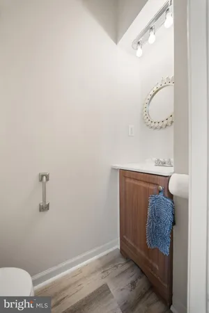 a bathroom with a mirror and a shower