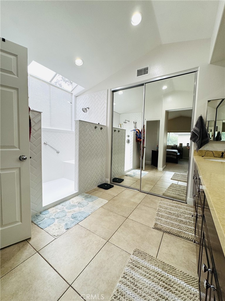 8115 East Star Pine Road Orange, CA 92869 - Photo 8 of 22 Master bathroom with huge dual head shower.