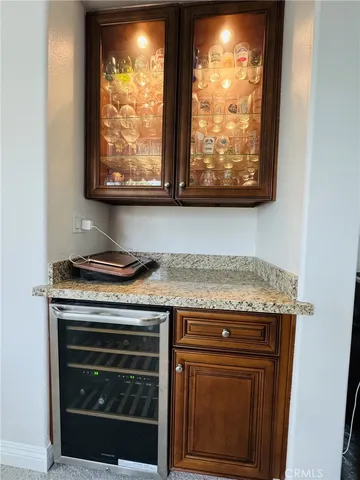a stove top oven sitting inside of a kitchen
