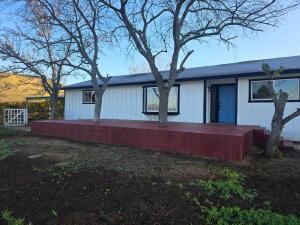 30536 George Smith Road Squaw Valley, CA 93675 - Photo 3 of 10 a front view of a house with a yard
