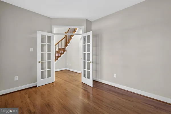a kitchen with stainless steel appliances granite countertop a sink a stove and a microwave