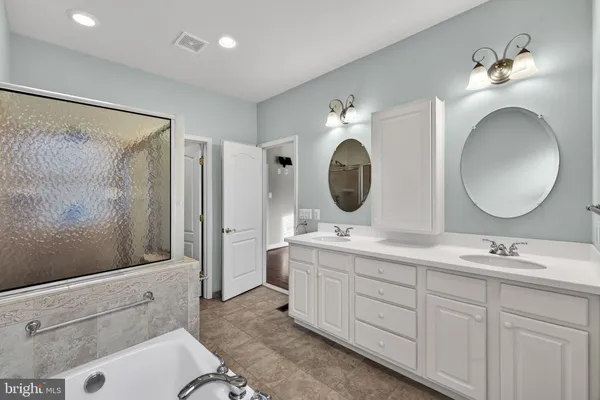 a view of a park with large trees